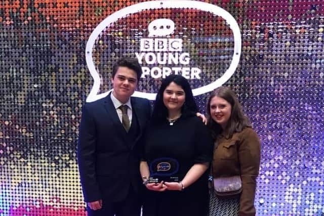 Niamh, pictured centre, after winning gold in the BBC Young Reporter Competition 2020