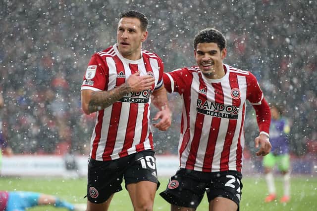 Billy Sharp celebates his goal for Sheffield United against Bristol City with Morgan Gibbs-White: Alistair Langham / Sportimage