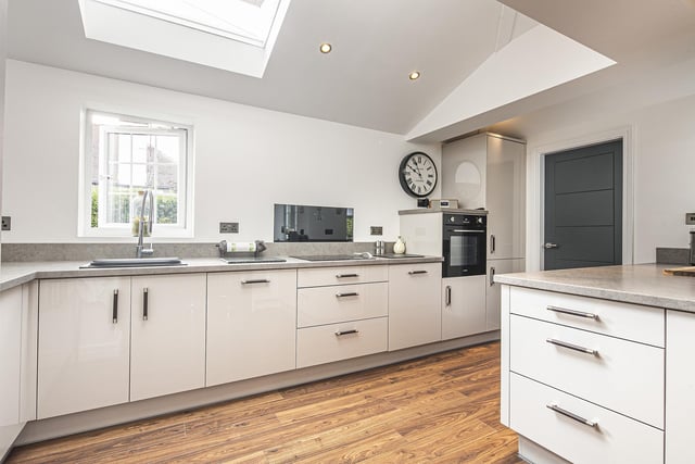 The kitchen looks lovely and matches the lights and greys colours the rest of the property follows.