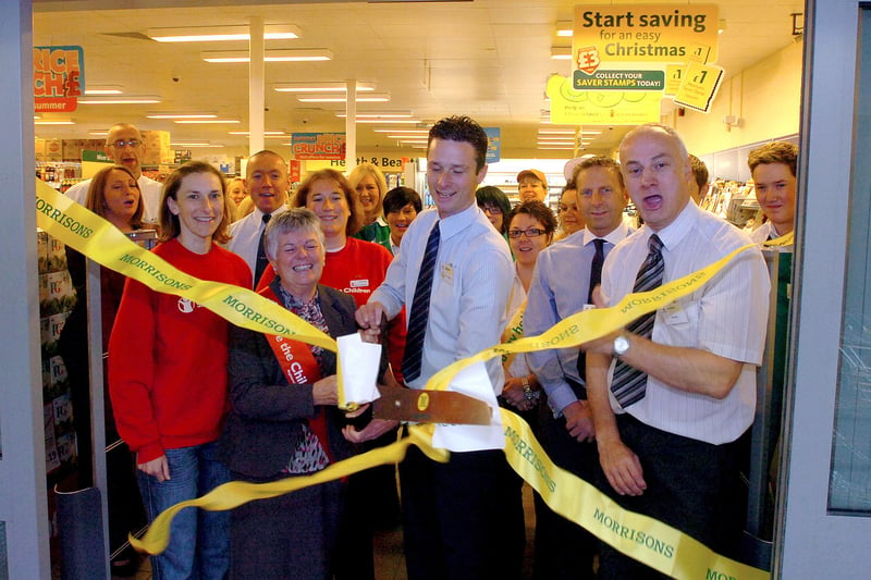 Cutting the ribbon to officially open the new Morrisons store in Castle View, Castletown were, left to right, Helen Ford, Norma Armstrong and Jenni Little all of Save the Children, store manager Paul Harrison, assistant deputy manager Jeff Williams and area manager Bob Grey. Were you there in 2011?