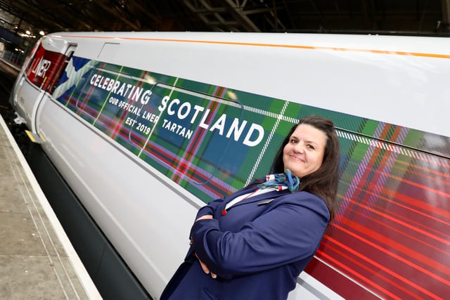 LNER launches its very own official tartan, as worn by staff, and displayed on the side of this train.