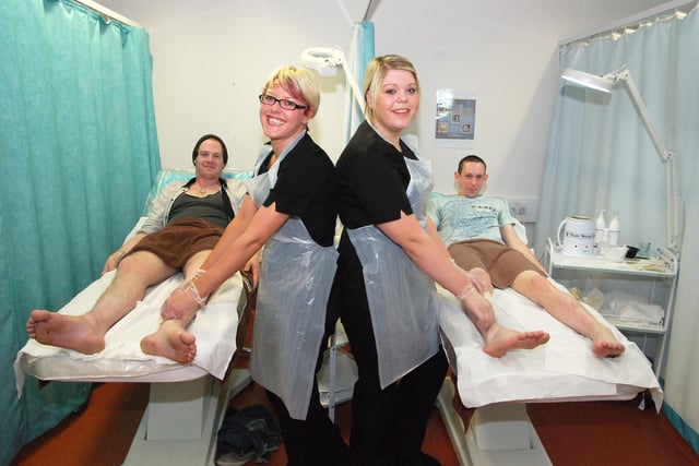 Doncaster's Housing for Young People took part in a leg waxing event at the hub in 2009, pictured l-r, Daniel Wraith, Trustee of Doncaster Housing for Young People, Jemma Leek, Emma Moore, both level 3 Beauty Therapy Students, Darrell Hughes, Secretary of the Young Person's Forum: Picture Michael Ford
