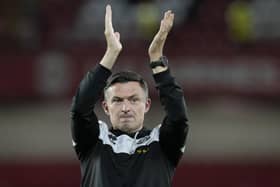 Paul Heckingbottom, the Sheffield United manager, applauds his side's supporters: Andrew Yates / Sportimage