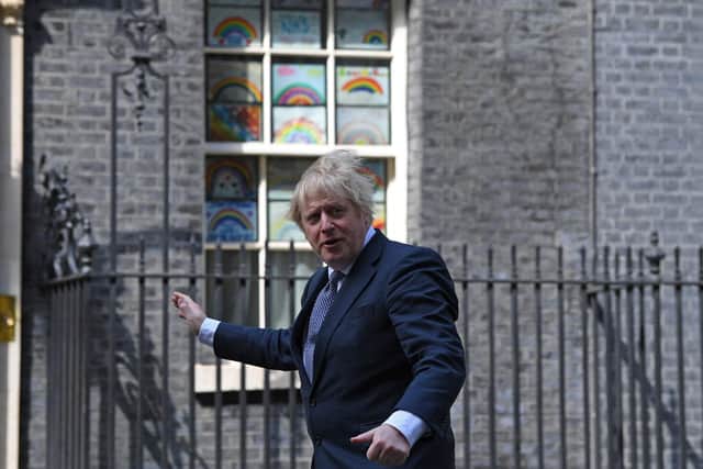 Boris Johnson pictured outside 10 Downing Street - on the day of the cheese and wine event. (Picture: AFP via Getty Images)