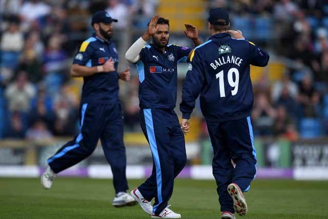 Azeem Rafiq of Yorkshire celebrates with teammate Gary Ballance after dismissing Karl Brown of Lancashire (Gareth Copley/Getty Images)