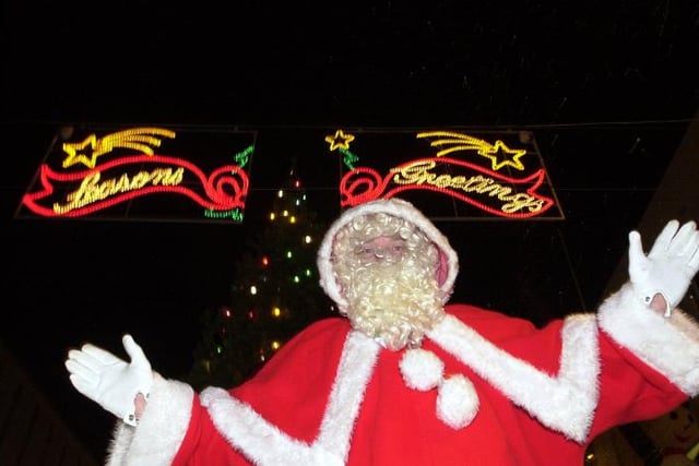 Santa visits the lights switch on event in 2002.