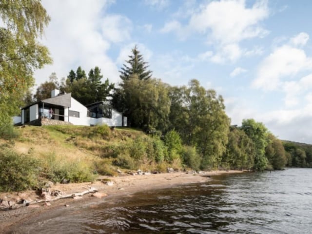This design-savvy abode, which sleeps six overlooks Loch Rannoch and has access to two private beaches.