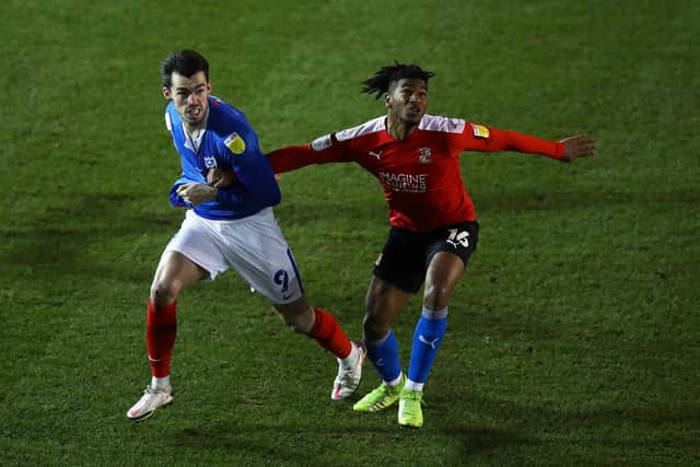 Swindon Town defender Akin Odimayo has been linked with a move to Sheffield Wednesday.