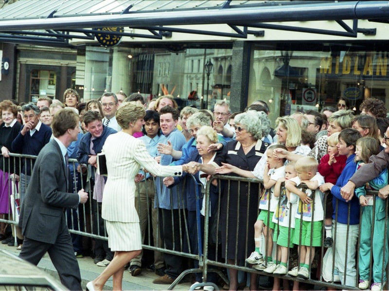 Princess Diana meets the gathered crowds on a visit to Sheffield Cutlers' Hall on July 16, 1991