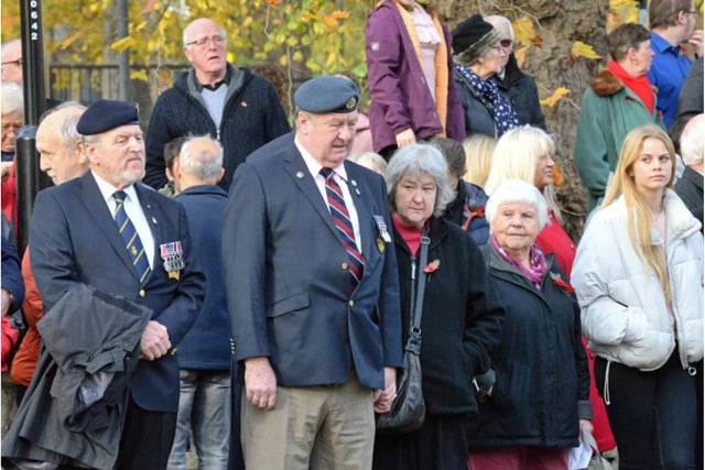 Veterans and members of the public fell silent.