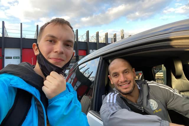 Yaroslav Matveev meets Sheffield United midfielder Adlene Guedioura outside Bramall Lane