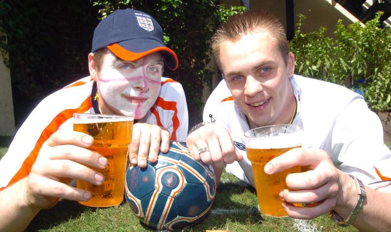Luke Wilson and Nathan Hutchinson  enjoying beer whilst watching England play.