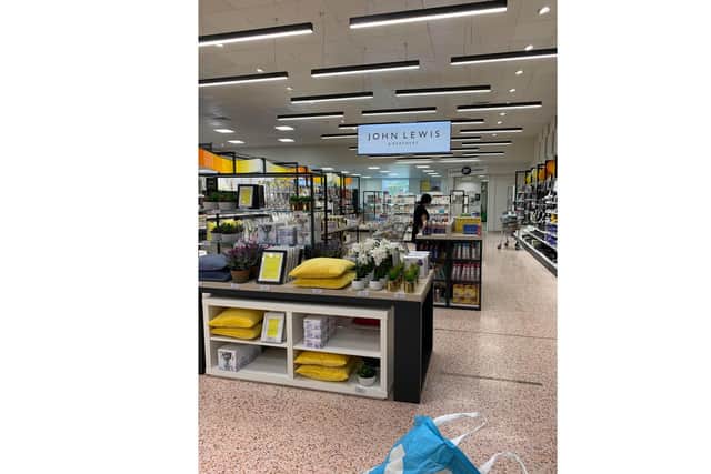 The new area in Waitrose is an attempt to look like a John Lewis store, a reader claims.