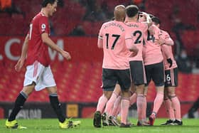 Sheffield United's Oliver Burke celebrates with his team-mates after scoring the winner in the 2-1 victory over Manchester United at Old Trafford last night. (Photo by Laurence Griffiths/Getty Images)