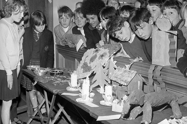Children with their works at an Exhibition of Arts in the Craigmillar Richmond Parish Church in October 1964.