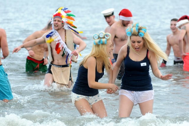 It's the St Clares Hospice 2012 Boxing Day Dip at Sandhaven Beach. Is there someone you know in this photo?