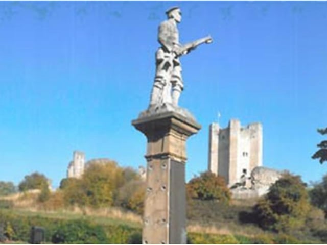 Conisbrough War Memorial sits in the shadow of Conisbrough Castle.