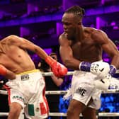 LONDON, ENGLAND - AUGUST 27: KSI (R) punches Luis Pineda (L) during their Cruiserweight Main Event Bout at The O2 Arena on August 27, 2022 in London, England. (Photo by Luke Walker/Getty Images)