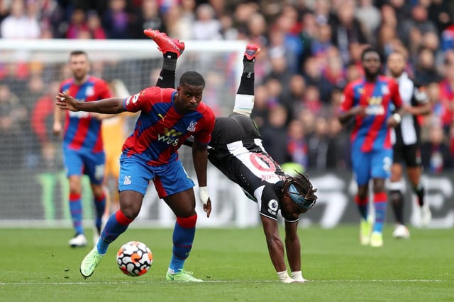 Marc Guehi of Crystal Palace evades the challenge of Allan Saint-Maximin of Newcastle United during the Premier League match between Crystal Palace and Newcastle United at Selhurst Park on October 23, 2021 in London, England.
