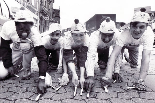 Locals from the Old Blue Bell sweep Fargate with toothbrushes for Comic Relief 1989