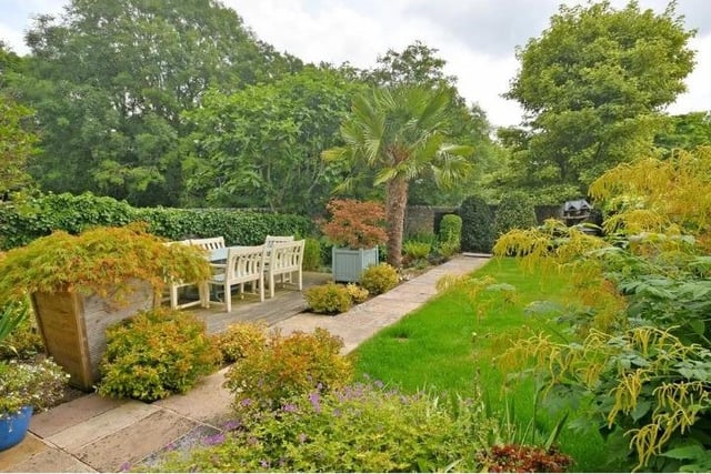 The front garden of the four-bedroom property in Bakewell is south-facing with access onto the riverside.  The front garden is south-east and contains a lawned area, timber decked seating terrace and a stocked fishpond. A full-height gate gives access to the footpath that runs alongside the River Wye. There is another good-sized garden at the back of the house where access can be gained to the property's garden room.