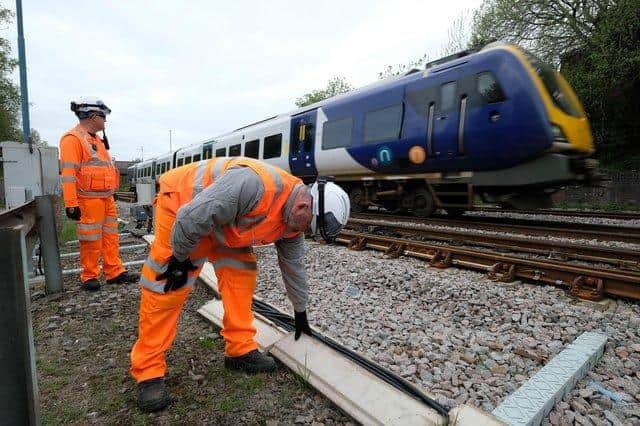 Network Rail and British Transport Police check on signalling cables alonside tracks in Sheffield. The number of cases of cable thefts across South Yorkshire, which officials say is being hit hardest nationally, soared last month.