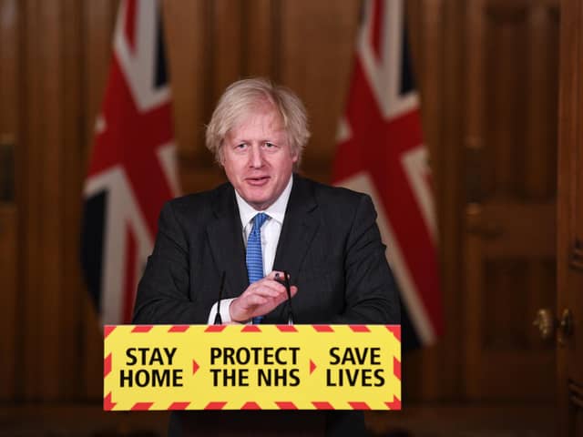 UK Prime Minister Boris Johnson talks during a Covid-19 media briefing in Downing Street. (Photo by Stefan Rousseau - WPA Pool/Getty Images)