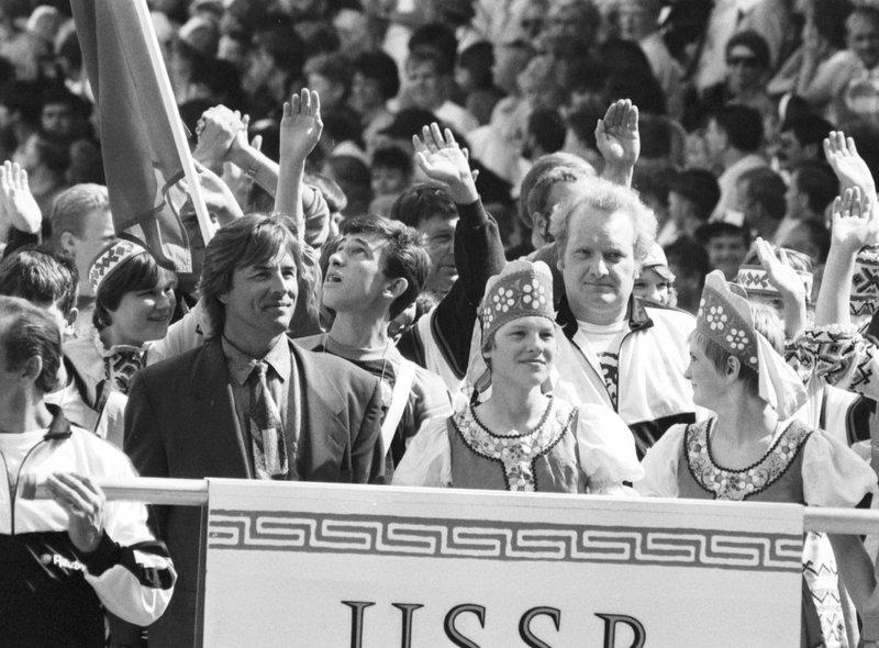 American actor Don Johnson leads the USSR team into Glasgow's Celtic Park for the European Special Olympics in July 1990.