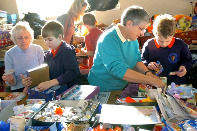 Pictured are pupils from North Anston Brook Primary School helping to pack shoe boxes in aid of Operation Christmas Child back in 2006