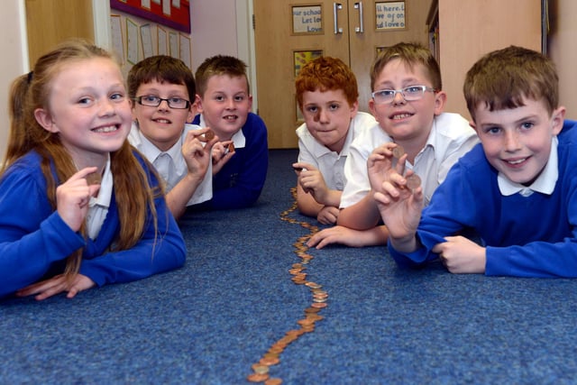 Darci Abbey, James Holland, Callum Smiles, Ben Curry, Reece Hall and Shaun Dennis were pictured with a trail of coins for UNICEF at Eskdale Academy. Who can tell us ore about this event from 5 years ago?