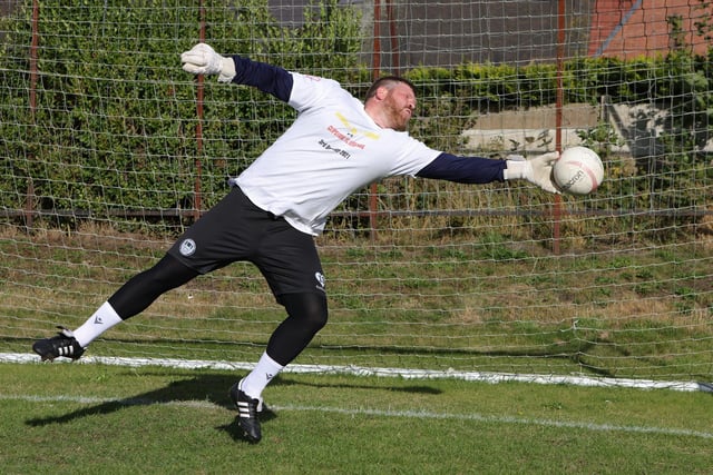 Clipstone keeper Gav Saxby warms up