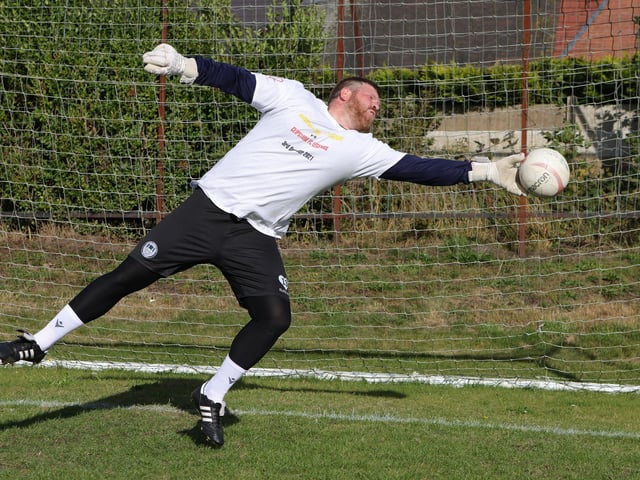 Clipstone keeper Gav Saxby warms up