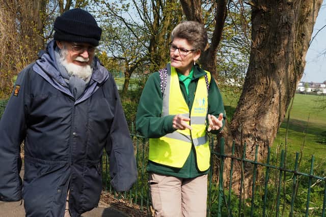 Step Out Sheffield Health Walk in Totley: Chair of Step out Sheffield Sue Lee talking to a fellow walker in 2019
