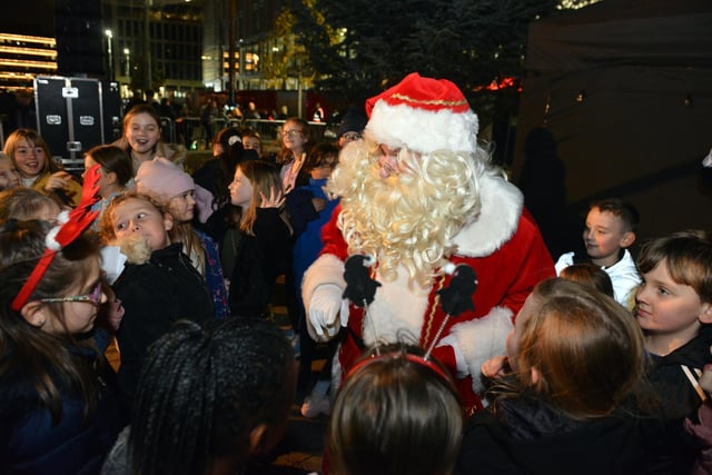 Santa Claus arrives at the start of the Christmas lights switch-on at Keel Square.