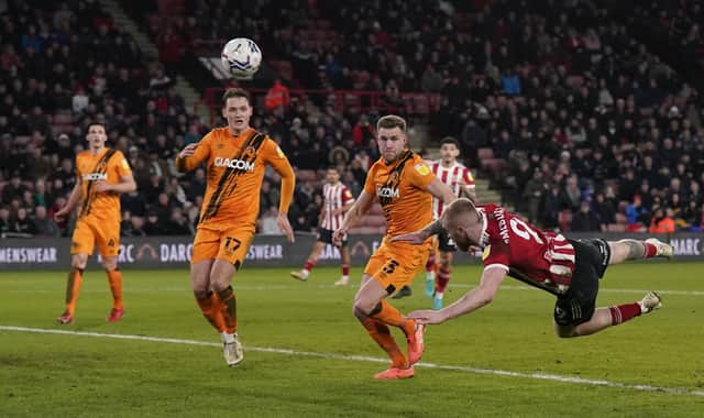 Former Swansea City striker Oli McBurnie started Sheffield United's game against Hull City: Andrew Yates / Sportimage