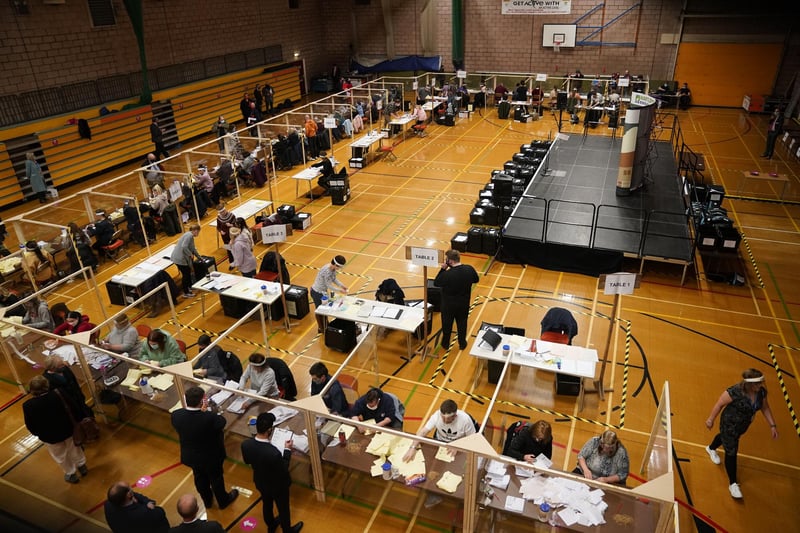 The counting teams hard at work at the Mill House Leisure Centre.