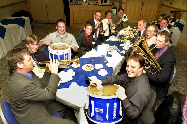 John Hemmingham, right, and members of the Sheffield Wednesday band, enjoy Christmas lunch in the Owls Centenary Restaurant at Hillsborough in December 2000.