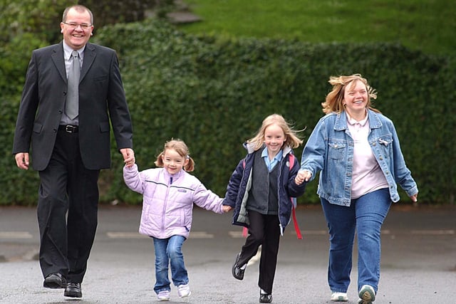 Hart Primary School head teacher Steve Donnell pictured with Jordane Rawlings, her mum Shirley and sister Kelsea during Walking To School Week in 2003.