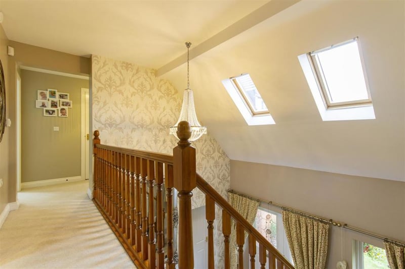 The galleried landing boasts two Velux windows, a storage cupboard and loft access hatch.