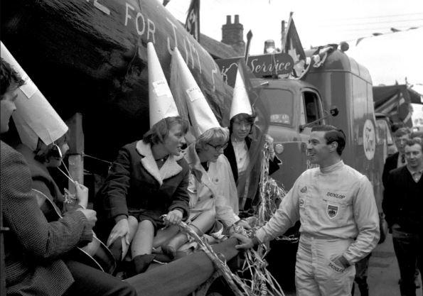 World champion F1 racing driver Jim Clark drove through the borders on an open top bus to meet the crowds, September 1965.