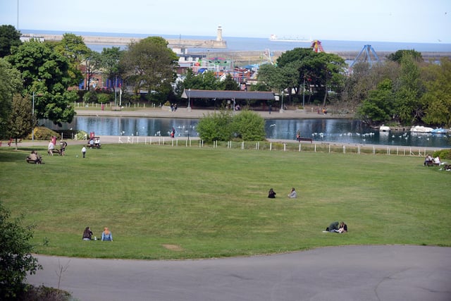 People made the most of the relaxed lockdown measures by enjoying a sit down on the grass at South Marine Park.