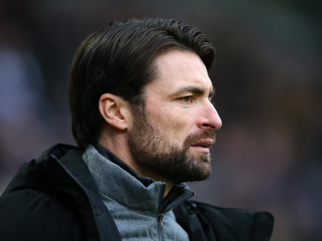 Average career win record: 30.4%. Best record: 30.4% (MK Dons). Worst record: N/A.