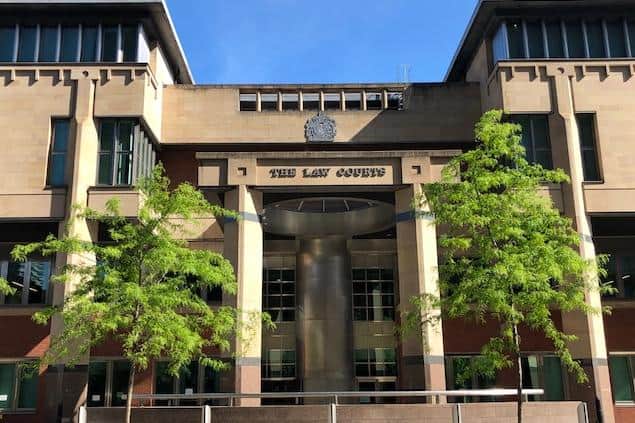A man has been given a 12-month community order with a 28-day curfew at Sheffield Crown Court, pictured, after he admitted twice producing fake documents to try and get his half-brother a job.