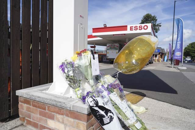 Floral tributes outside the Esso petrol station on East Bank Road, Sheffield, to a man named locally as Ash, who died following a collision involving a motorbike and a car on Sunday, September 4. Picture Scott Merrylees