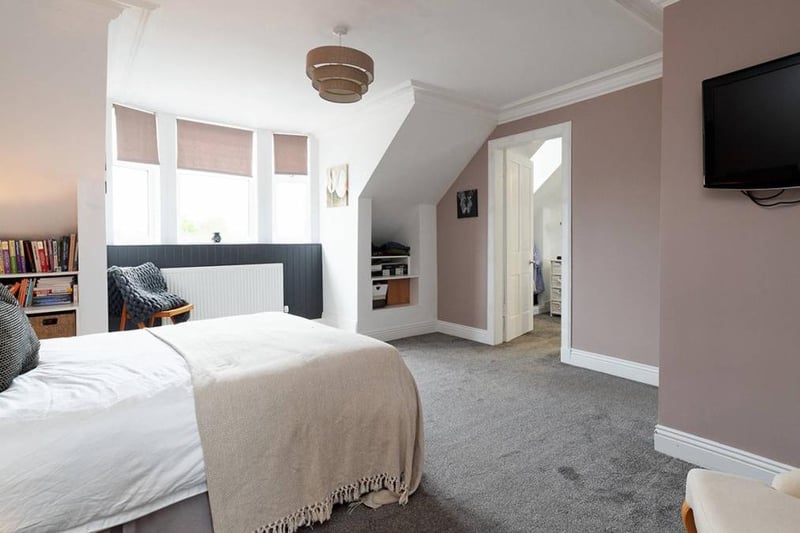 The master bedroom boasts an en-suite with shower over the bath; there is also a dressing area in this room and a feature has been made of the bay window.