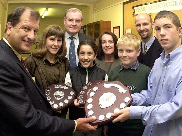 Former jockey Bob Champion (left) pictured admiring some of the prizes at the City School sports awarda night with pupils Natalie Brooks, Lauren Hoyland, Matthew Blackburn and Richard Elliott. Looking on are head teacher Julie Warne (rear centre) Mr Jim Gale, director of the Northern Racing College and Mr Steve Roberts, head of PE at the City School, on July 6, 2000