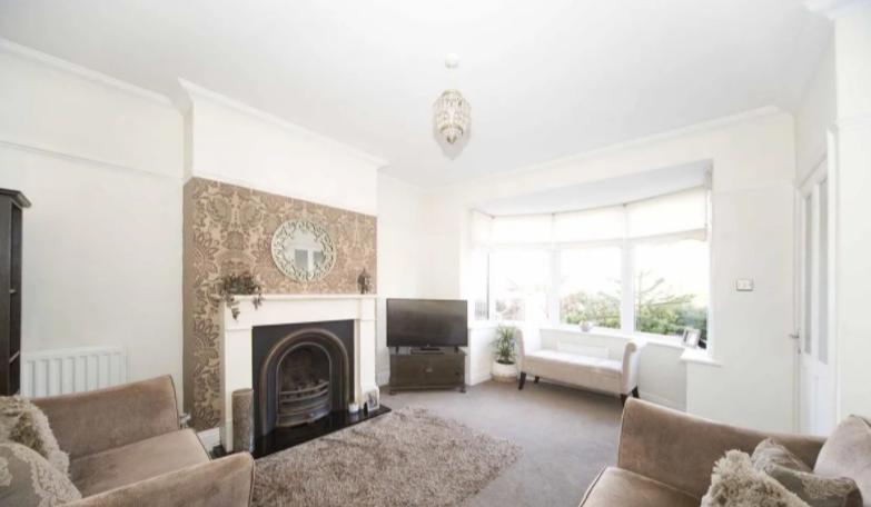 The lounge boasts stylish decor and feature fireplace.