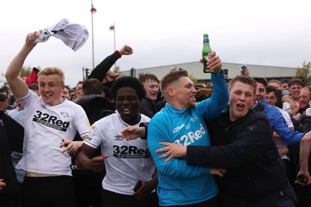 Derby County celebrated survival from the Championship on Saturday.