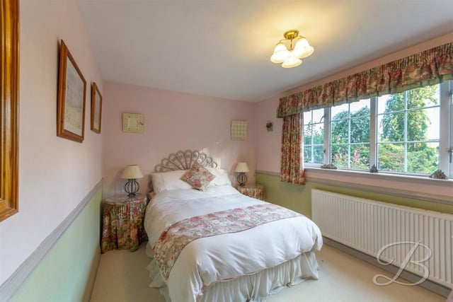 All the other bedrooms are also a good size. This one includes a carpeted floor, central-heating radiators and a window.