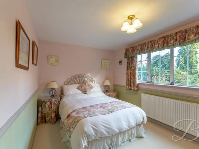 All the other bedrooms are also a good size. This one includes a carpeted floor, central-heating radiators and a window.